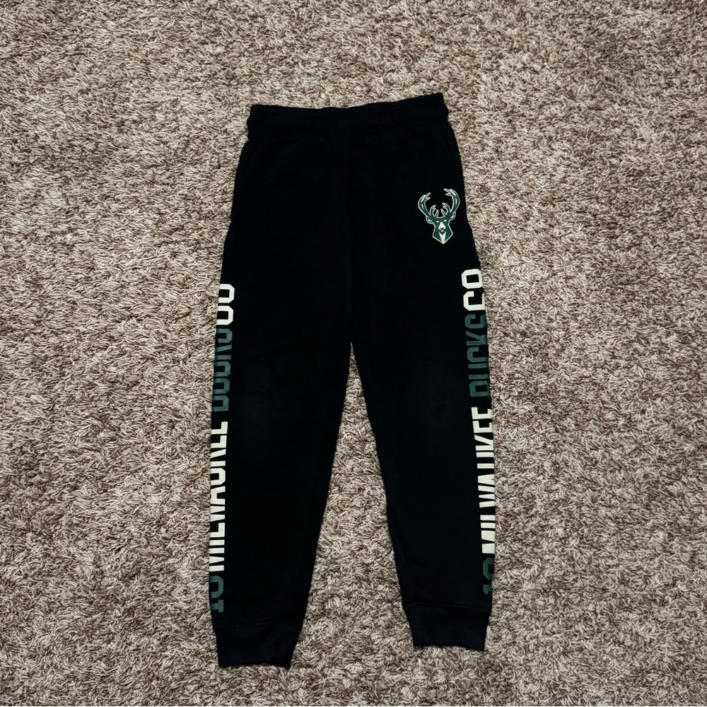 Milwaukee Bucks sweat pants, featuring NBA logo. Youth Medium